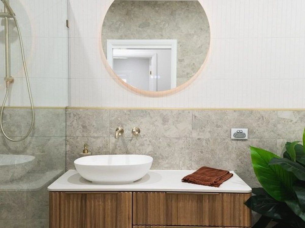 Ensuite in the same home, walk in shower behind frameless glass